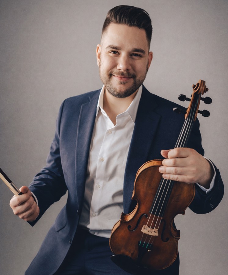 Portrait of Anthony Sabberton, a Violin Teacher holding a Violin